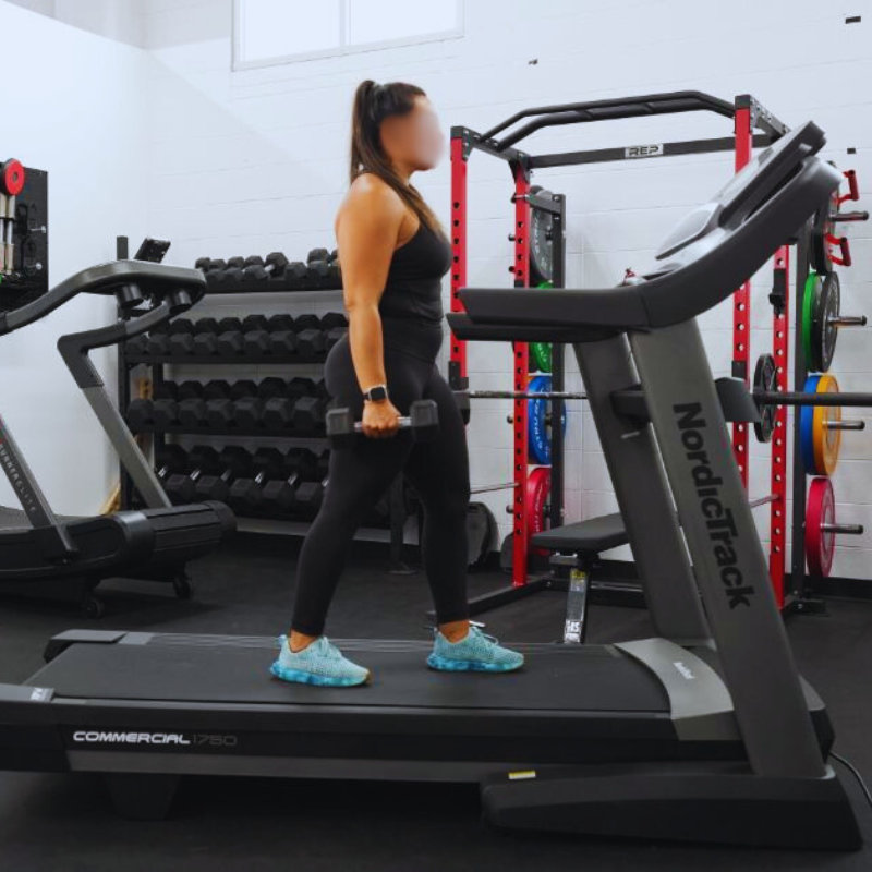 Women in a Treadmill with Weights